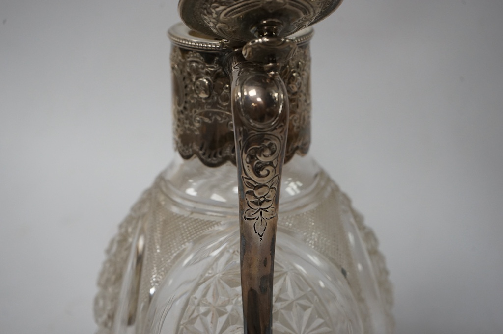 A late Victorian silver mounted cut glass claret jug, Z. Barraclough & Sons, Sheffield, 1894, 21cm. Condition - poor to fair